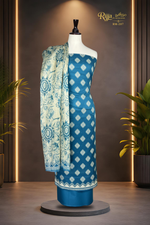 MURASHE Rijja RM-207 premium unstitched lawn suit with intricate floral patterns in vibrant colors, fabric detail visible.