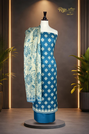 MURASHE Rijja RM-207 premium unstitched lawn suit with intricate floral patterns in vibrant colors, fabric detail visible.
